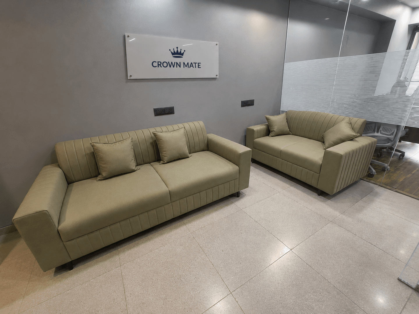 The Crownmate office reception with the Crown Mate sign on the wall